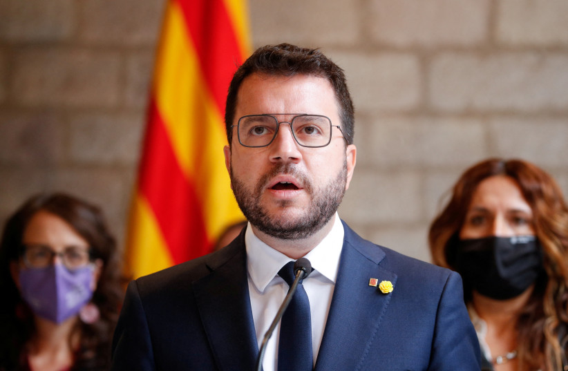 Catalonia's regional President Pere Aragones gives a news conference at Palau de la Generalitat, following the arrest of former Catalan government head Carles Puigdemont in Sardinia on Thursday, in Barcelona, Spain, September 24, 2021. (credit: REUTERS/Albert Gea/File Photo)
