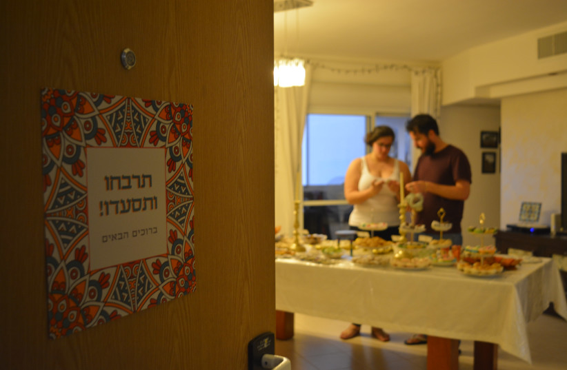  Mimouna at the Arviv family in Ashkelon, Israel. (credit: YONA ABEDDOUR)