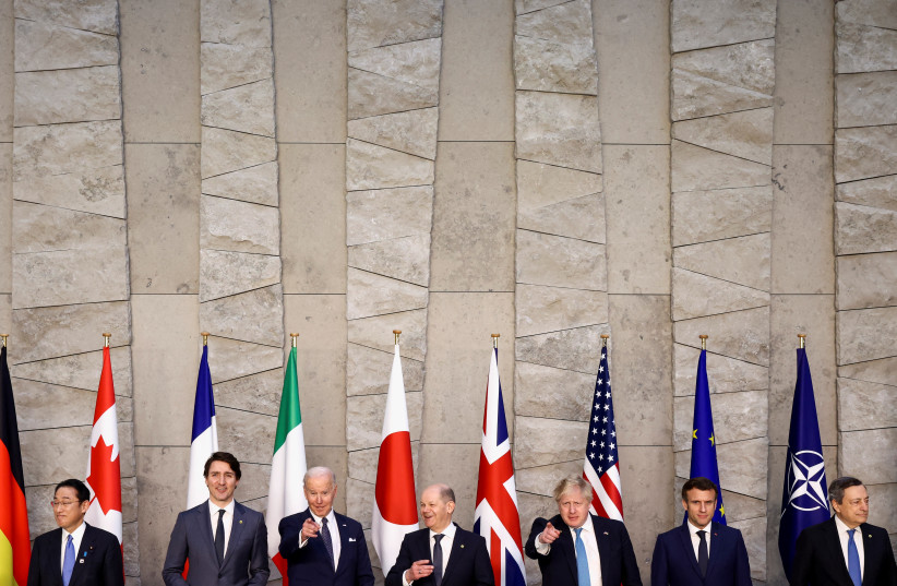  anada's  PM Justin Trudeau, US President Joe Biden, German Chancellor Olaf Scholz, Britain's PM Boris Johnson, France's President Emmanuel Macron, Japan's PM Fumio Kishida and Italy's PM Mario Draghi at the G7 summit in  summit in Brussels, Belgium, March 24, 2022. (credit: REUTERS/HENRY NICHOLLS)