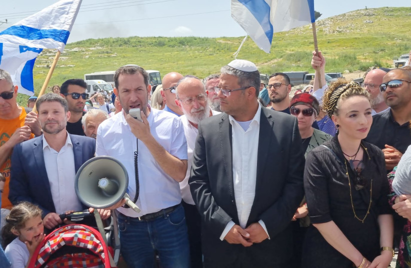  Otzma Yehudit MK Itamar Ben-Gvir, Religious Zionist Party head Bezalel Smotrich and other right-wing politicians attend a demonstration at the West Bank settlement of Homesh (credit: SAMARIA REGIONAL COUNCIL)