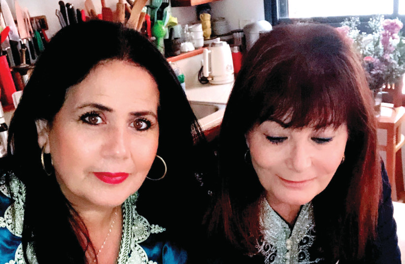  THE WRITER (R) with Mimi Nidam. (credit: PASCALE PEREZ-RUBIN)