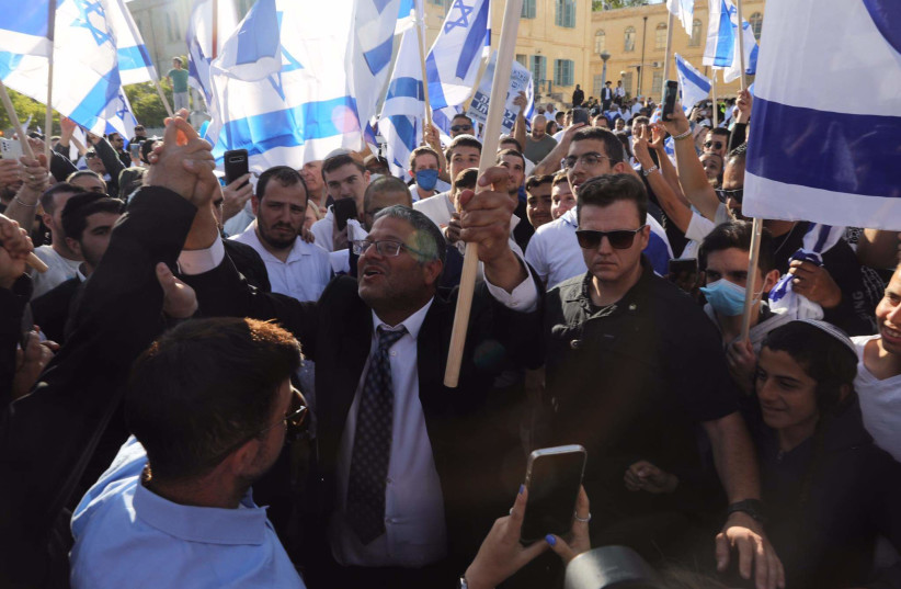  Otzma Yehudit head Itamar Ben-Gvir joins a flag march towards Jerusalem's Old City, April 20, 2022 (credit: MARC ISRAEL SELLEM)