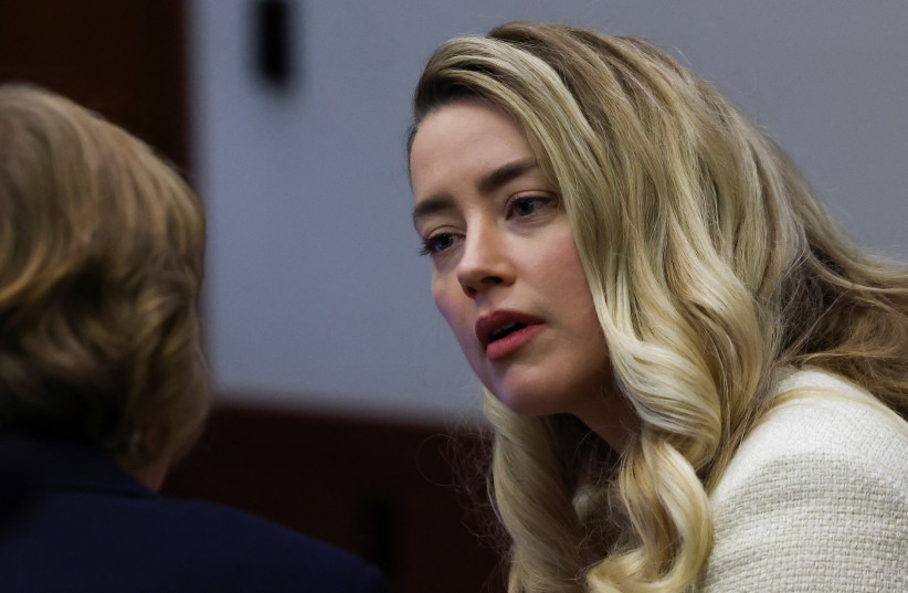  Actor Amber Heard attends Johnny Depp's defamation trial against her at the Fairfax County Circuit Courthouse in Fairfax, Virginia, US, April 20, 2022. (credit: EVELYN HOCKSTEIN/POOL/REUTERS)