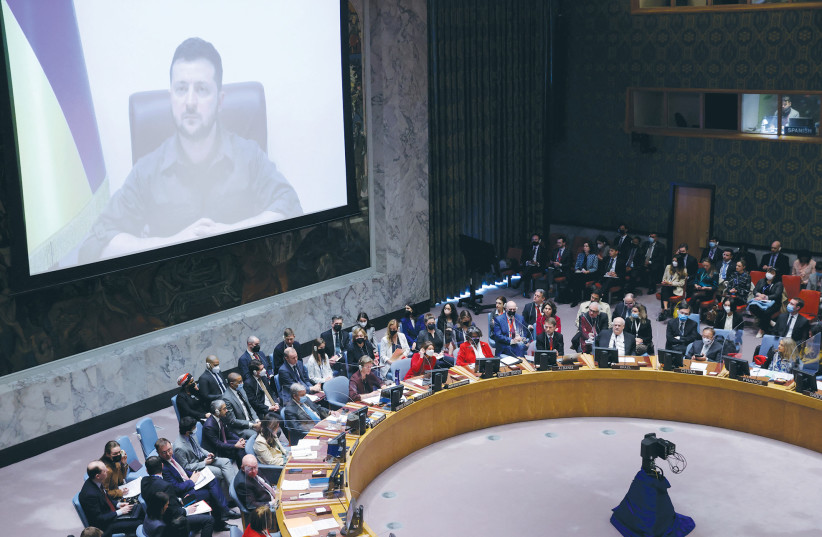  UKRAINIAN PRESIDENT Volodymyr Zelensky appears before the UN Security Council via video link, earlier this month.  (credit: Andrew Kelly/Reuters)