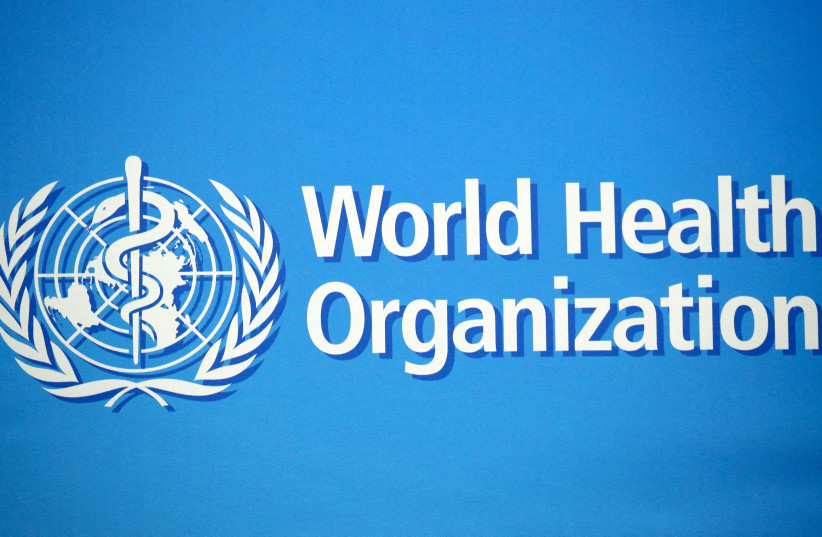A logo is pictured at the World Health Organization (WHO) building in Geneva, Switzerland, February 2, 2020. (credit: REUTERS/DENIS BALIBOUSE/FILE PHOTO)
