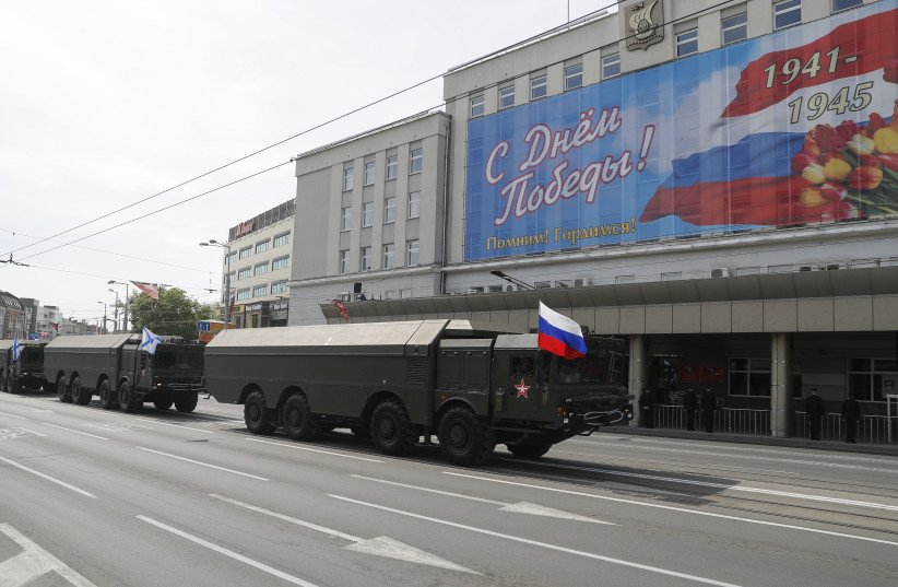  Russian servicemen drive Iskander-M missile launchers during the Victory Day parade, which marks the anniversary of the victory over Nazi Germany in Kaliningrad, Russia May 9, 2019. (photo credit: VITALY NEVAR/REUTERS)