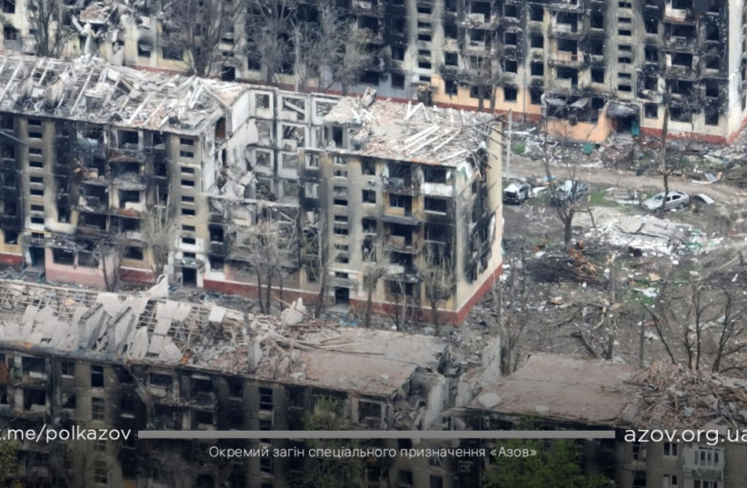  An aerial view shows damaged buildings, amid Russia's ongoing invasion of Ukraine, in Mariupol, Ukraine in this handout picture taken with a drone released April 24, 2022. (credit: AZOV/HANDOUT VIA REUTERS)