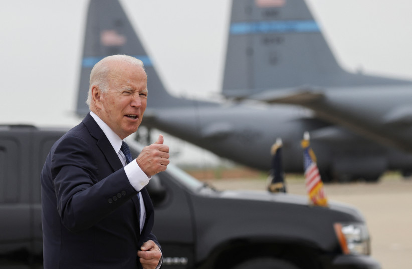  US President Joe Biden gestures as he arrives to board Air Force One at Delaware Air National Guard Base, in New Castle, Delaware, US, April 25, 2022. (credit: TASOS KATOPODIS/ REUTERS)