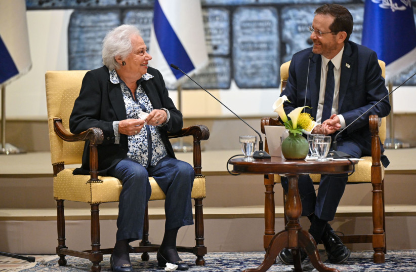  President Isaac Herzog hosts Ines Nissim, a Holocaust survivor, as part of the Zikaron Basalon series, April 25, 2022.  (photo credit: KOBI GIDEON/GPO)
