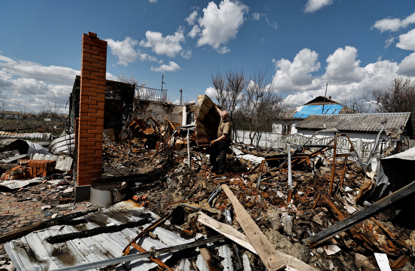  Destroyed homes amid Russia's invasion of Ukraine in Kolychivka. (photo credit: REUTERS/ZOHRA BENSEMRA)