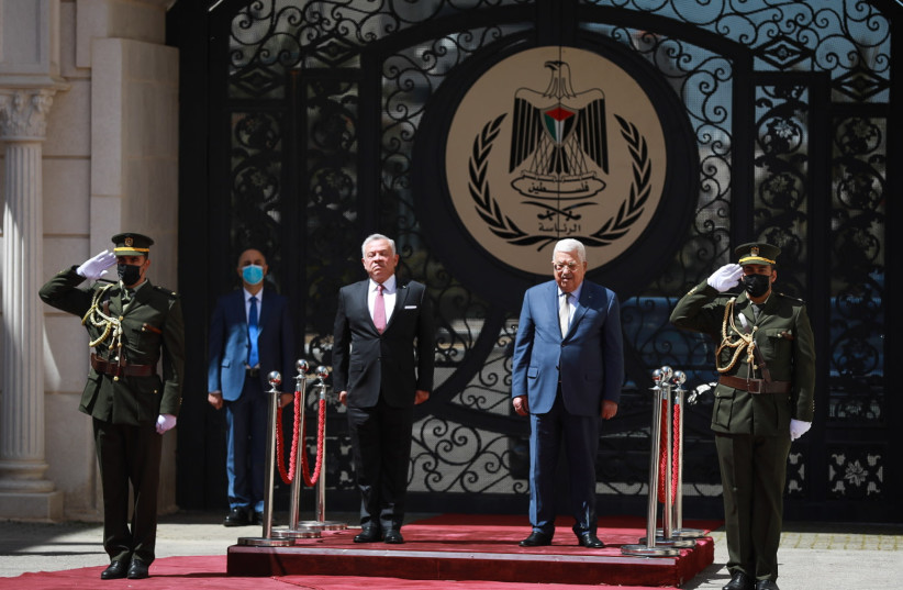  Jordan's King Abdullah II seen with Palestinian president Mahmoud Abbas, during a welcome ceremony in the West Bank city of Ramallah. (credit: FLASH90)