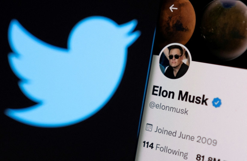  A photo illustration shows Elon Musk's twitter account and the Twitter logo (credit: REUTERS/RADU SIGHETI)