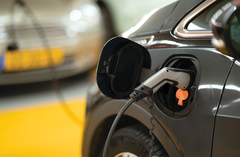  THE FIRST 100 car-charging stations have been set up all over the city. (photo credit: Michael Fousert/Unsplash)