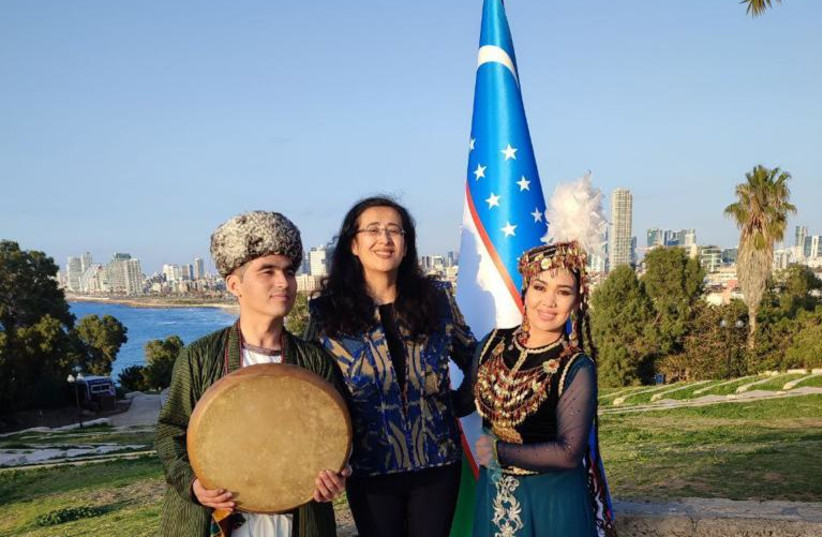  Uzbekistan's Ambassador to Israel, Ms. Feruza Makhmudova with two Uzbekistani dancers; IMTM 2022, the 28th International Mediterranian Tourism Market. (credit: Embassy of Uzbekistan in Israel)