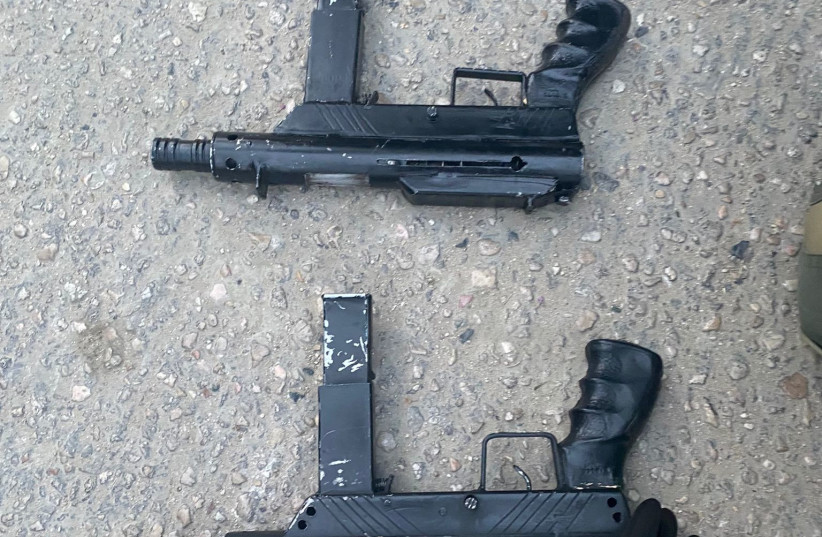  Weapons used by the terrorists in the Ariel shooting attack that left one dead, Friday April 29, 2022 (credit: ISRAEL POLICE SPOKESPERSON'S UNIT)