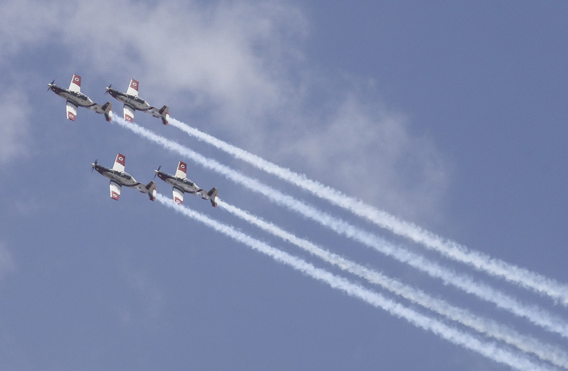  Israel Air Force Aerobatics Team exercises in the sky, May 1, 2022.  (photo credit: MARC ISRAEL SELLEM/THE JERUSALEM POST)