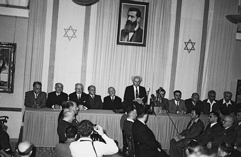  DAVID BEN-GURION reads the Declaration of Independence on Friday, May 14, 1948, in Tel Aviv. (photo credit: HANS PINN/GPO)