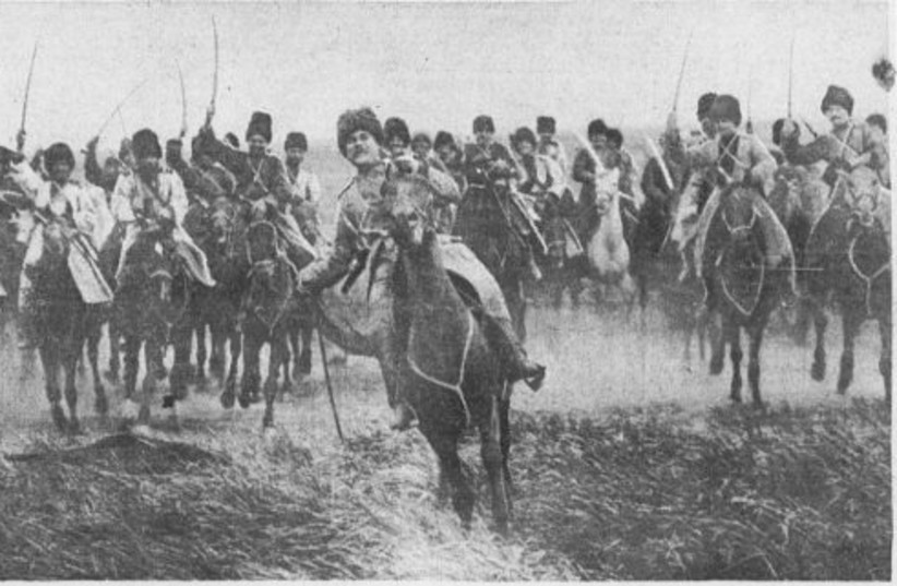  “Wild Charge of The Most-Feared Troops in the Army of the Czar, The Cossacks” photo published in the Evening Public Ledger, March 1, 1915. (credit: LIBRARY OF CONGRESS/PUBLIC DOMAIN)