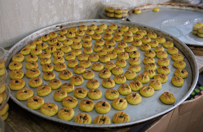  Date cookies in Al-Najah Sweets, in Jerusalem's Old City. (credit: CRYSTAL DUNLAP/THE MEDIA LINE)