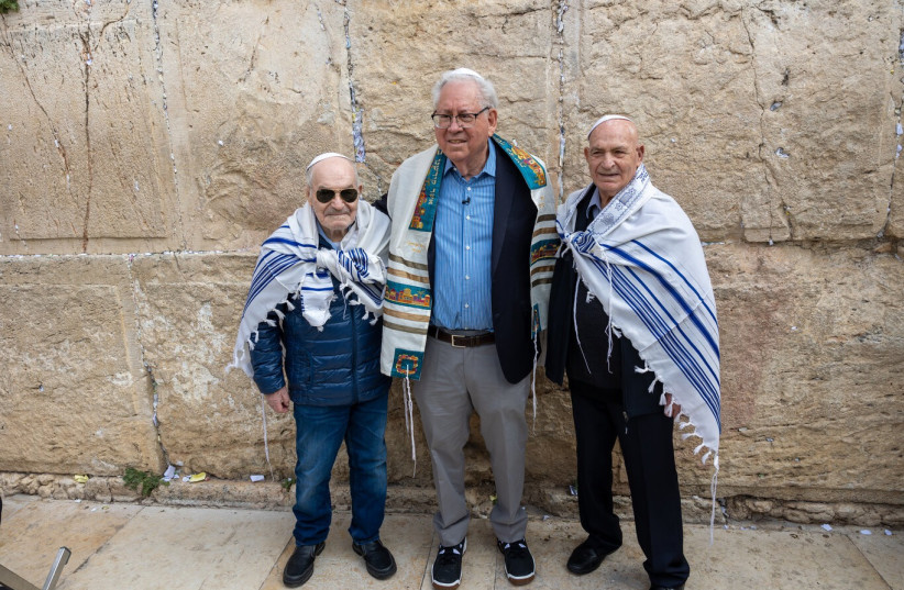  George, Oscar, and Walter at their family reunion at the Western Wall during their bar mitzvah (photo credit: UNITED HATZALAH‏)