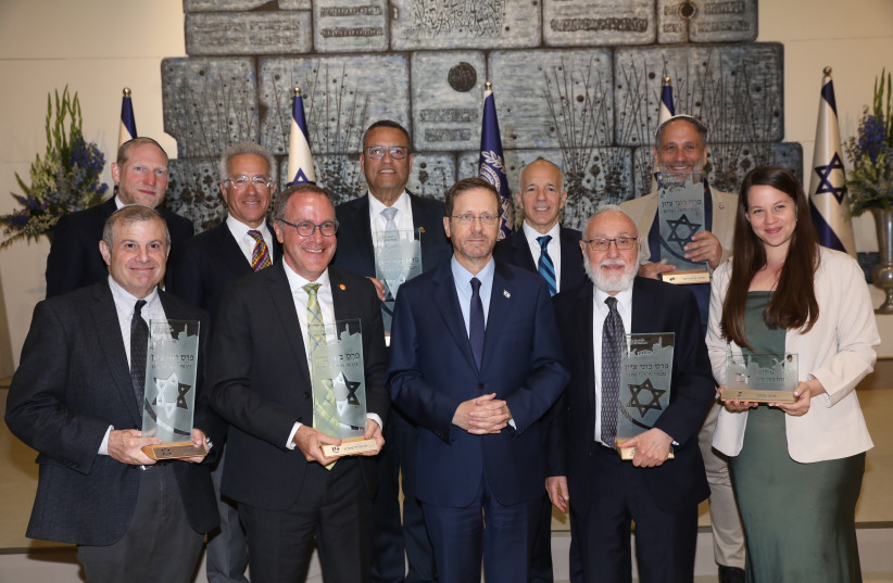  Recipients of the Sylvan Adams Nefesh B’Nefesh Bonei Zion Prize, are presented with the 2021 awards for English-speaking Olim who have made a notable impact on Israeli society,  at the President's Residence. (photo credit: ELI DASSA)
