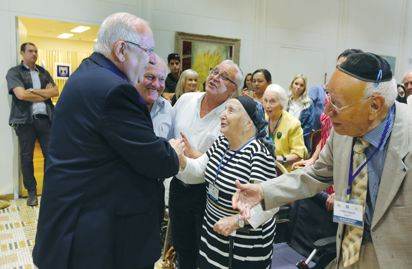  Former president Reuven Rivlin held a reception at the President’s Residence in 2018 for Israelis aged 100 and over. (credit: MARC ISRAEL SELLEM)