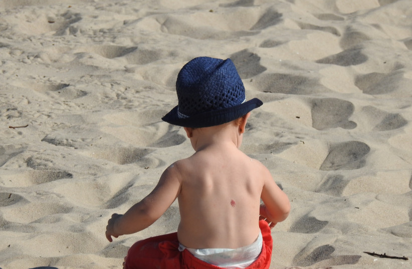  Baby on the beach (Illustrative) (photo credit: PIXABAY)