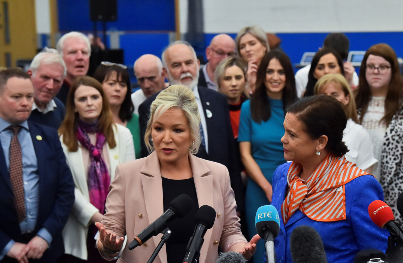 Sinn Fein deputy leader Michelle O'Neill speaks to the media next to party leader Mary Louise McDonald, at the Meadowbank Sports Arena count centre, in Magherafelt, Northern Ireland, May 7, 2022. (credit: REUTERS/CLODAGH KILCOYNE)