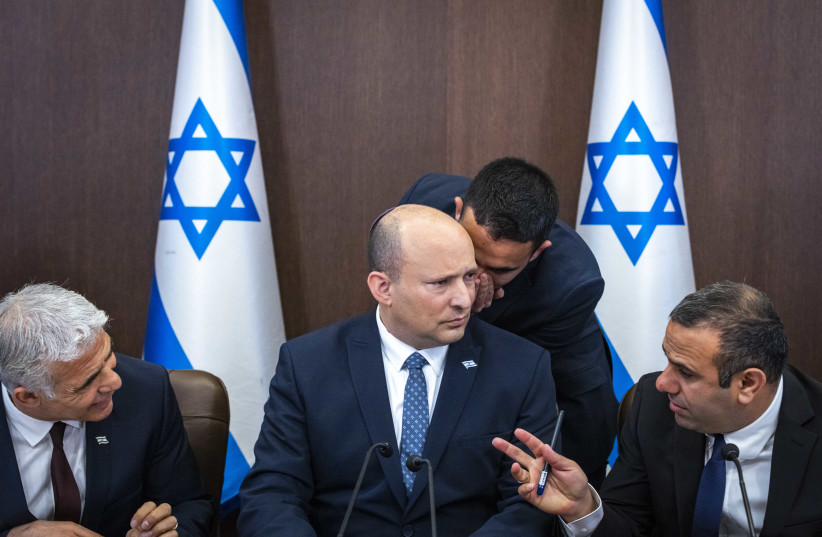Israeli Prime Minister Naftali Bennett leads a cabinet meeting at the Prime Minister's Office in Jerusalem on May 8, 2022. (photo credit: OLIVIER FITOUSSI/FLASH90)