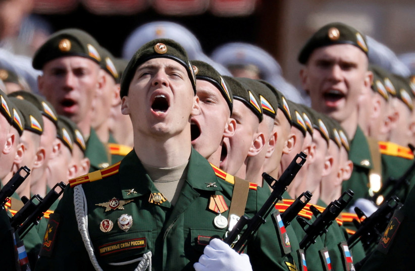  Russian service members take part in a military parade on Victory Day, which marks the 77th anniversary of the victory over Nazi Germany in World War Two, in Red Square in central Moscow, Russia May 9, 2022. (credit: REUTERS/MAXIM SHEMETOV)