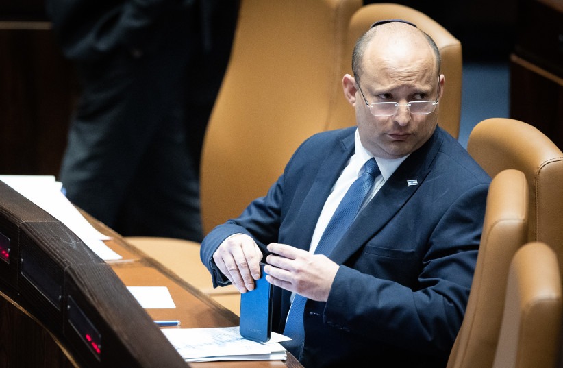  Israeli Prime Minister Naftali Bennett in the opening of the Knesset summer session at the assembly hall of the Knesset, the Israeli parliament in Jerusalem on May 9, 2022.  (photo credit: YONATAN SINDEL/FLASH90)