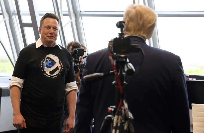 Former US president Donald Trump and Elon Musk are seen at the Firing Room Four after the launch of a SpaceX Falcon 9 rocket and Crew Dragon spacecraft on NASA's SpaceX Demo-2 mission to the International Space Station from NASA's Kennedy Space Center in Cape Canaveral, Florida, US May 30, 2020 (photo credit: REUTERS/JONATHAN ERNST)
