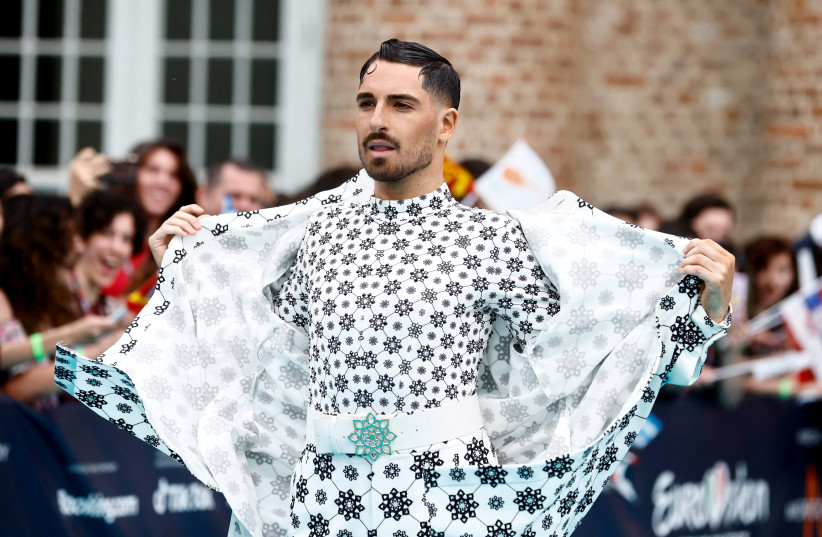  Contestant Michael Ben David poses on the ''Turquoise Carpet'' during the opening ceremony of the 2022 Eurovision Song Contest in Turin, Italy, May 8, 2022.  (credit: REUTERS/YARA NARDI)