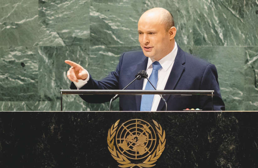 Prime Minister Naftali Bennett addresses the United Nations General Assembly last year. Every year, the UN censures Israel far more than any other country.  (photo credit: JOHN MINCHILLO/REUTERS)
