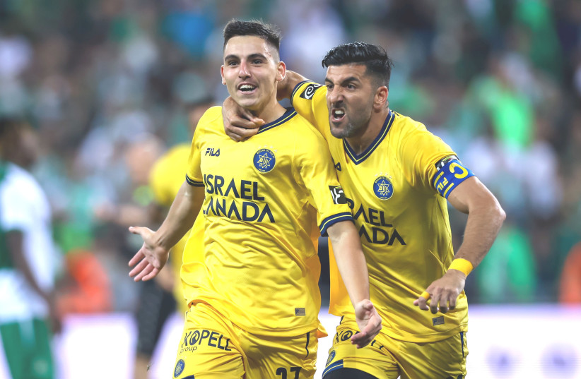  MACCABI TEL AVIV may have won the game on Tuesday night at Sammy Ofer Stadium, but it was host Maccabi Haifa that secured the league title. (credit: MAOR ELKASLASI)