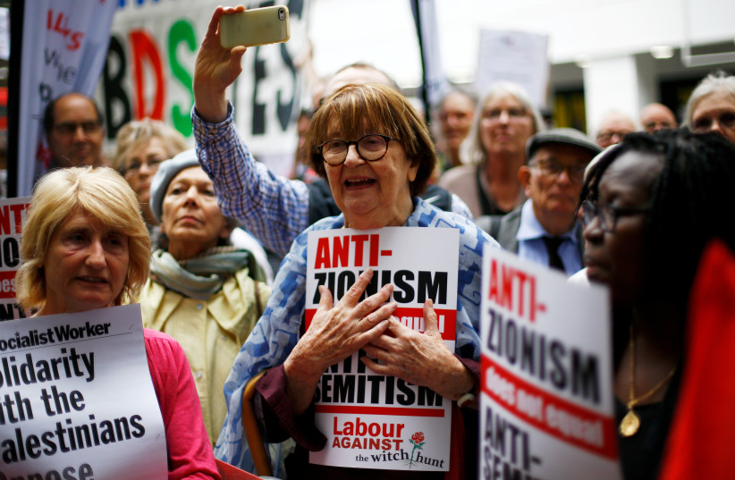  PROTESTING OUTSIDE the National Executive of Britain’s Labour Party, which was set to discuss the party’s definition of antisemitism, 2018. (photo credit: HENRY NICHOLLS/REUTERS)