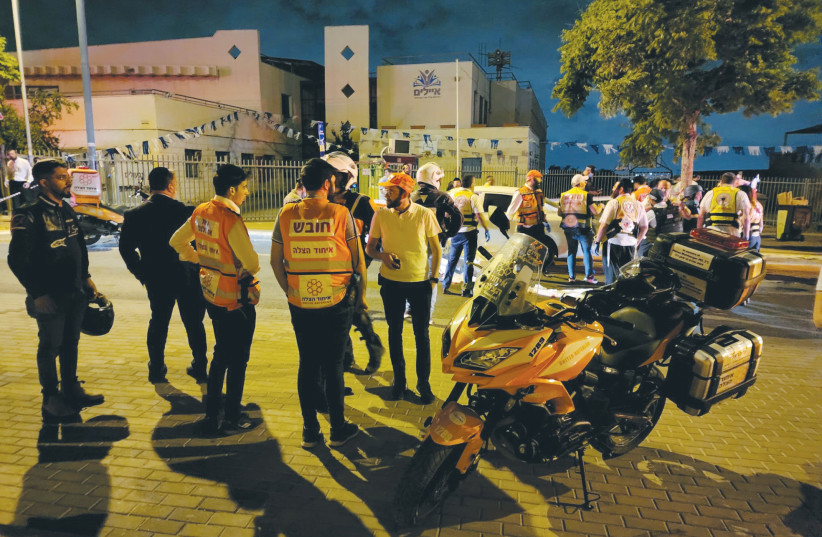 UNITED HATZALAH EMTs from Elad respond to the fatal terror attack in the city on May 5.  (credit: UNITED HATZALAH‏)