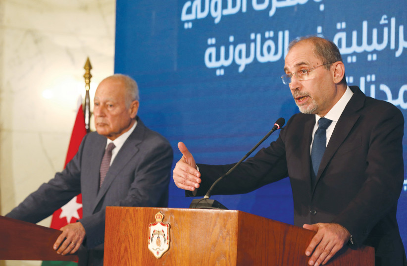  JORDANIAN FOREIGN MINISTER Ayman Safadi speaks at a news conference in Amman last month, with Arab League Secretary-General Ahmed Aboul Gheit at his side. This week, Safadi brazenly declared that Israel has no sovereignty over the Jerusalem holy sites.  (photo credit: Alaa Al Sukhni/Reuters)