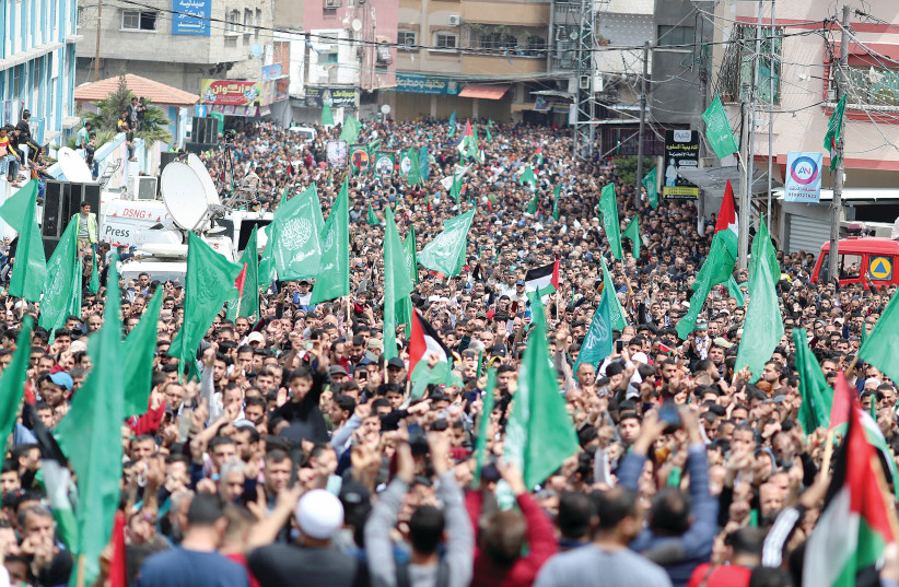  HAMAS SUPPORTERS attend a protest to support Al-Aqsa mosque, in Gaza, last month.  (credit: MOHAMMED SALEM/REUTERS)