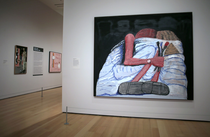  A view of the Philip Guston painting ''Couple in Bed'' (1977) is seen at a major show at the Museum of Fine Arts, Boston, April 27, 2022.  (credit: Lane Turner/The Boston Globe via Getty Images)