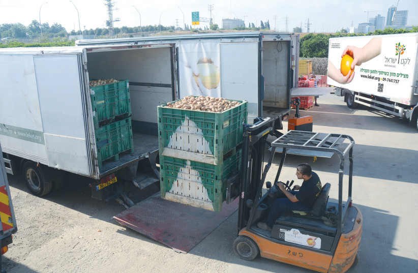 PRODUCE, RESCUED by Leket Israel to benefit Israelis in need, is loaded for distribution to its partner agencies. (photo credit: LEKET ISRAEL)