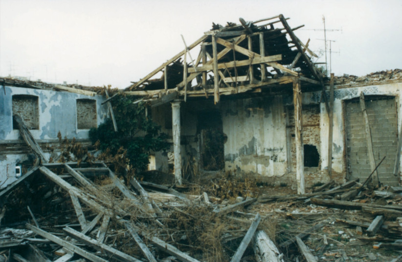  THE STATE of the Beth El synagogue in Komotini is surveyed by the writer in 1993, a year prior to its demolition. (photo credit: ELIAS MESSINAS)