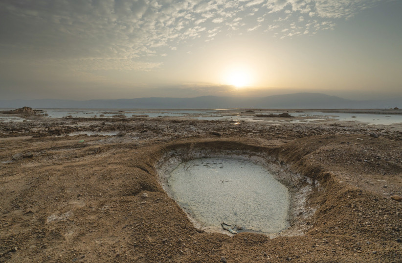  A SINKHOLE NEAR the Dead Sea. (photo credit: YANIV NADAV/FLASH90)