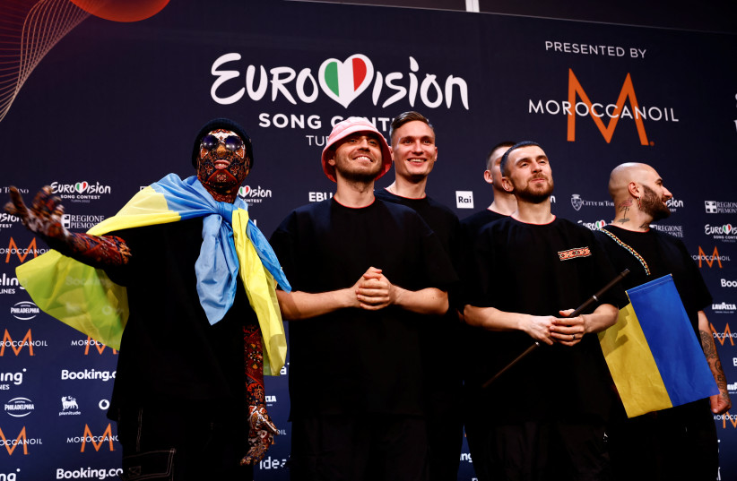  Kalush Orchestra from Ukraine pose for photographers after winning the 2022 Eurovision Song Contest, in Turin, Italy, May 15, 2022. (photo credit: Yara Nardi/Reuters)
