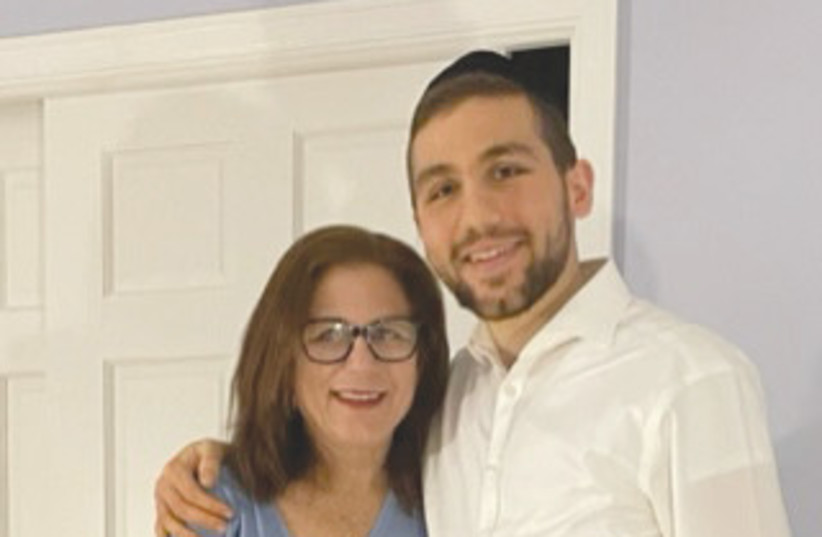  THE WRITER, a Reform rabbi, poses with her Haredi son, Benji Frisch. (photo credit: TALI FRISCH)