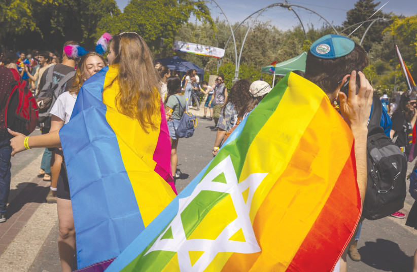  PARTICIPANTS GATHER at last year's Jerusalem March for Pride and Tolerance. LGBTQ+ people in Jerusalem come from incredibly precarious circumstances and need abundant resources. (photo credit: OLIVIER FITOUSSI/FLASH90)