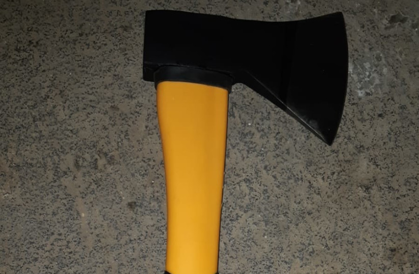  Axe carried by Palestinian suspect arrested by police at Tapuah Junction, May 16, 2022 (photo credit: ISRAEL POLICE)