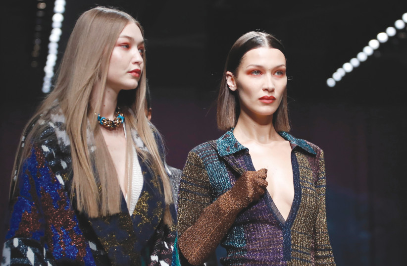  MODELS GIGI HADID (left) and Bella Hadid present a creation during Milan Fashion Week in 2020. If they lived in Gaza or Ramallah and dared to dress like that, they would be in immediate mortal danger. (photo credit: ALESSANDRO GAROFALO/REUTERS)