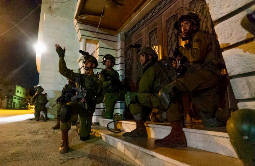  IDF soldiers work to arrest Palestinians as part of Operation Break the Wave (photo credit: IDF SPOKESPERSON'S UNIT)
