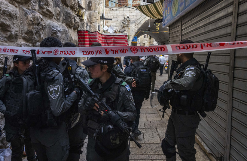  Israeli security forces at the scene of an attack that appears to be of a terrorist nature near Temple Mount, in Jerusalem's Old City. May 11, 2022.  (credit: OLIVIER FITOUSSI/FLASH90)